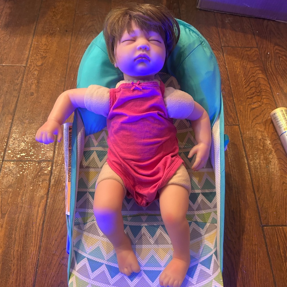Reborn Doll with Pink Outfit and Brown Hair